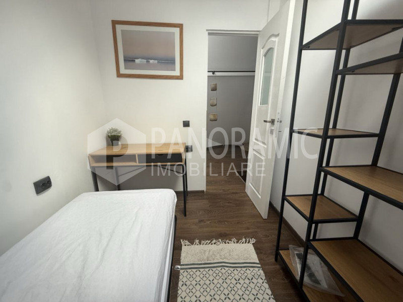 Apartament cu 3 camere (2 dormitoare) - strada Ploiești